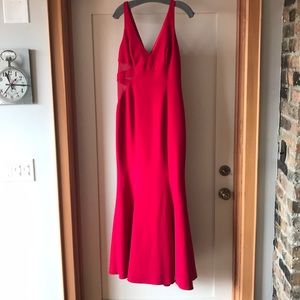 Jay Godfrey Red evening gown with side mesh panel.